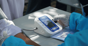 Checking someone's blood pressure