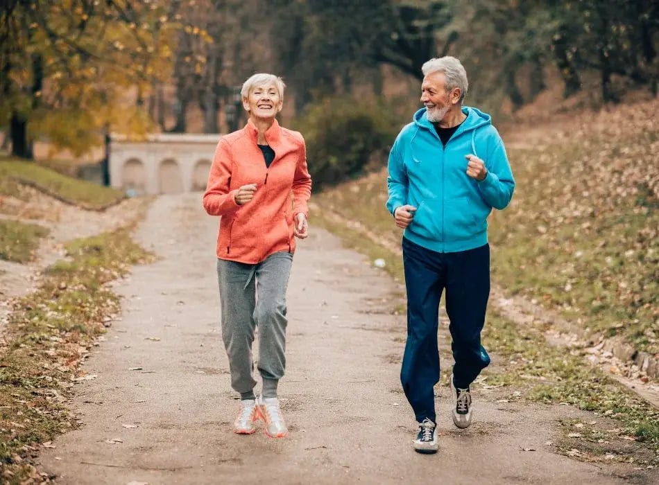 older couple walking outside