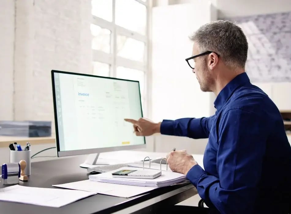 man on computer