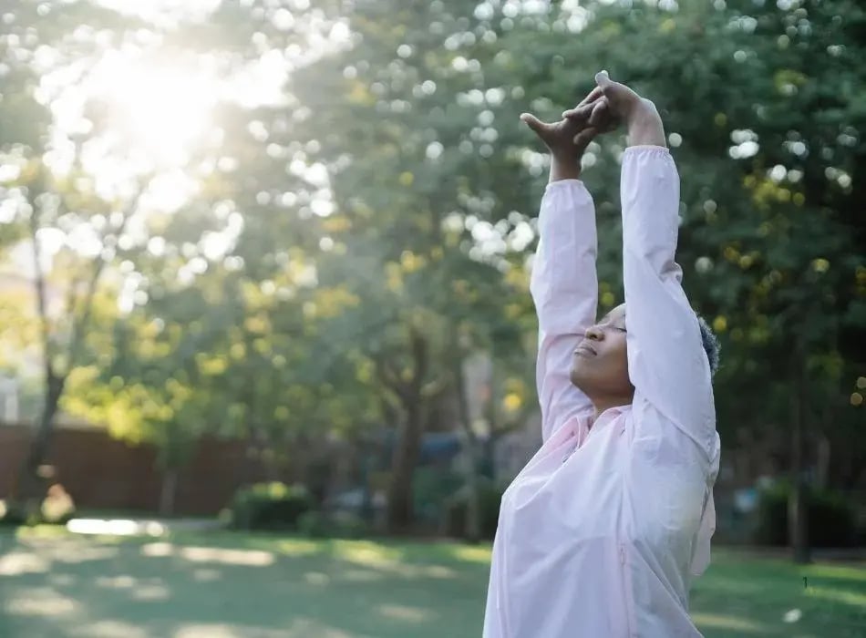 woman stretching outside