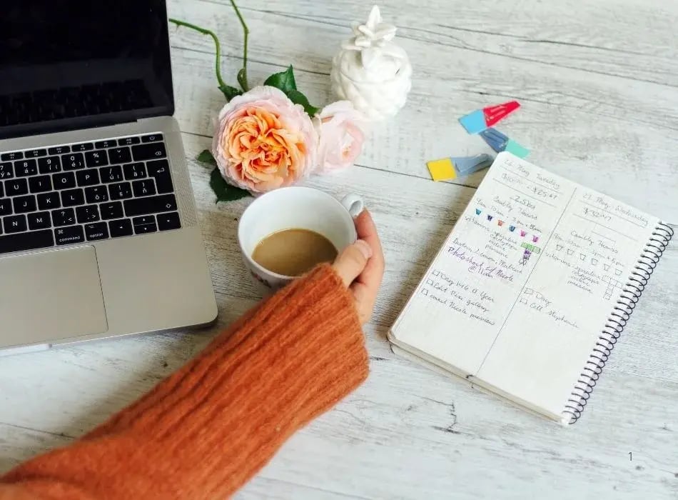 journal with laptop