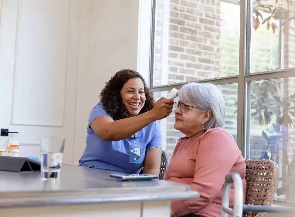 nurse doing health visit