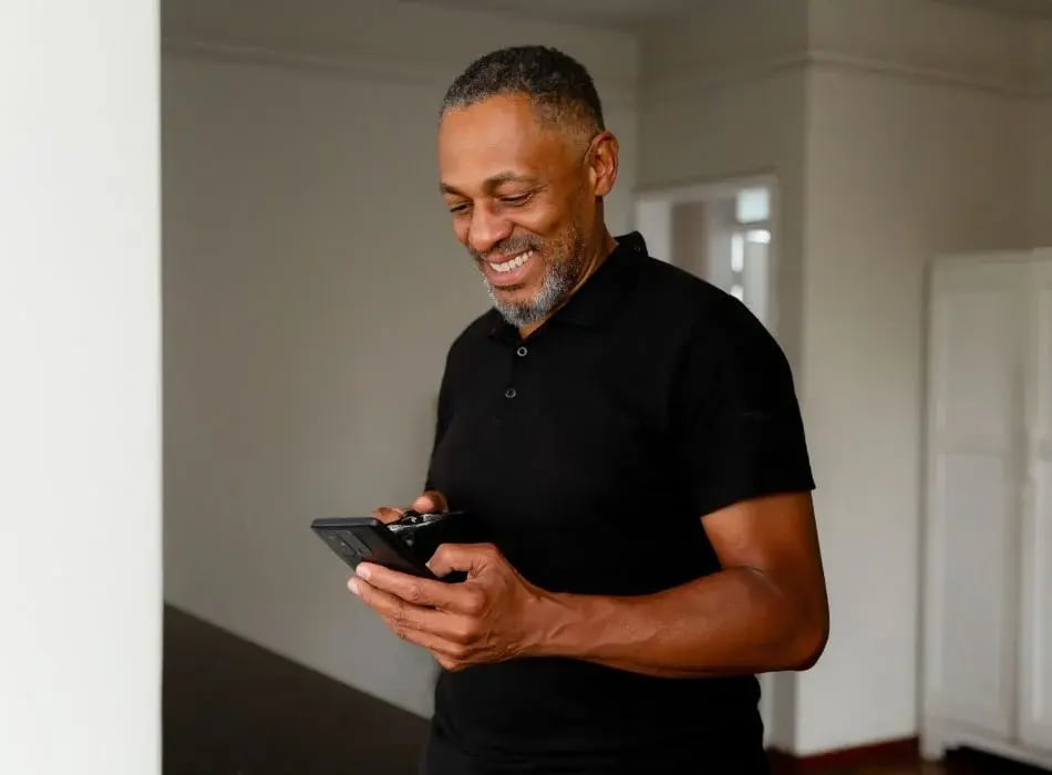 man loioking at phone