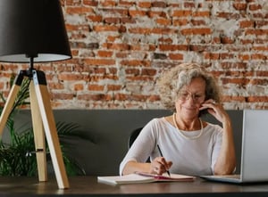 Woman working at her desk