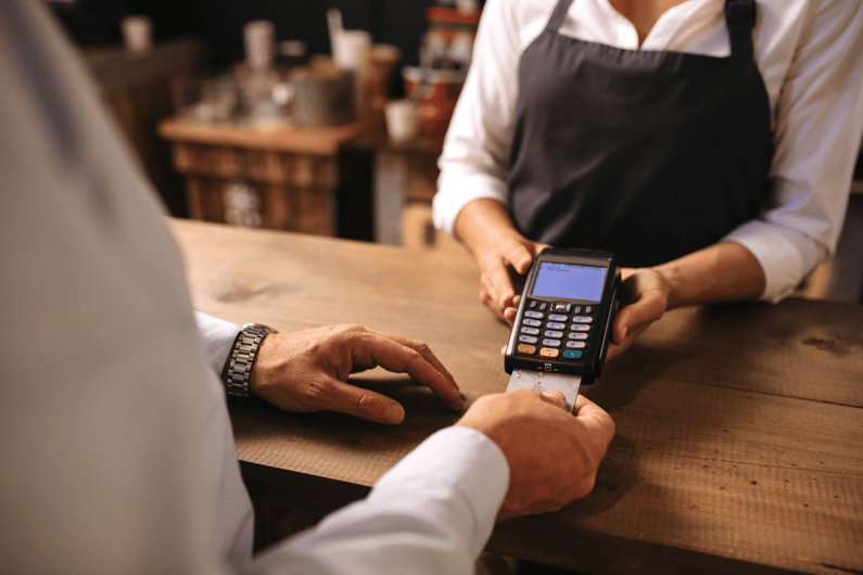 paying bill at counter